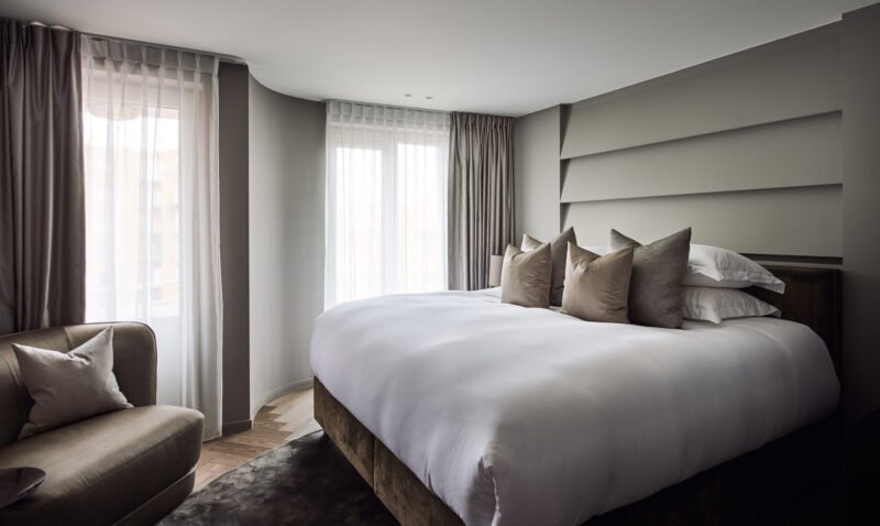 interior design beige pillows of bed